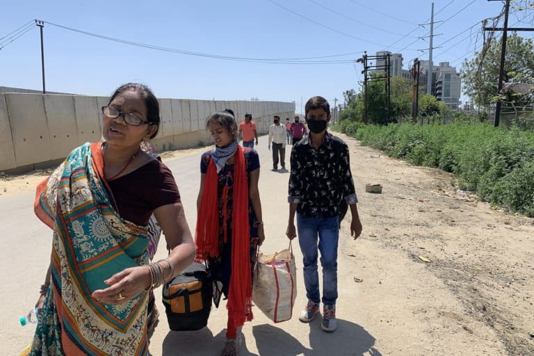 Migrants walk from Delhi to their homes in Ghaziabad after the national COVID-19 lockdown was imposed. Photo by Prerna Prasad.