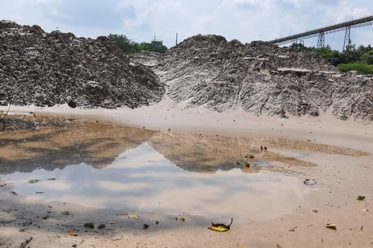 The tailings from the processing of ore contributes to a number of diseases in the local population. Photo by Sohail Khan.