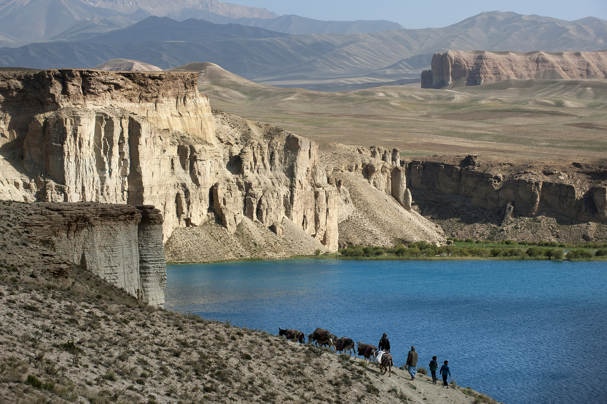Band-e Amir National Park is Afghanistan's first national park, located in the Bamyan Province. It is a series of six deep blue lakes separated by natural dams made of travertine, a mineral deposit.Photo: Alex Treadway/ ICIMOD Photo: Alex Treadway/ICIMOD.