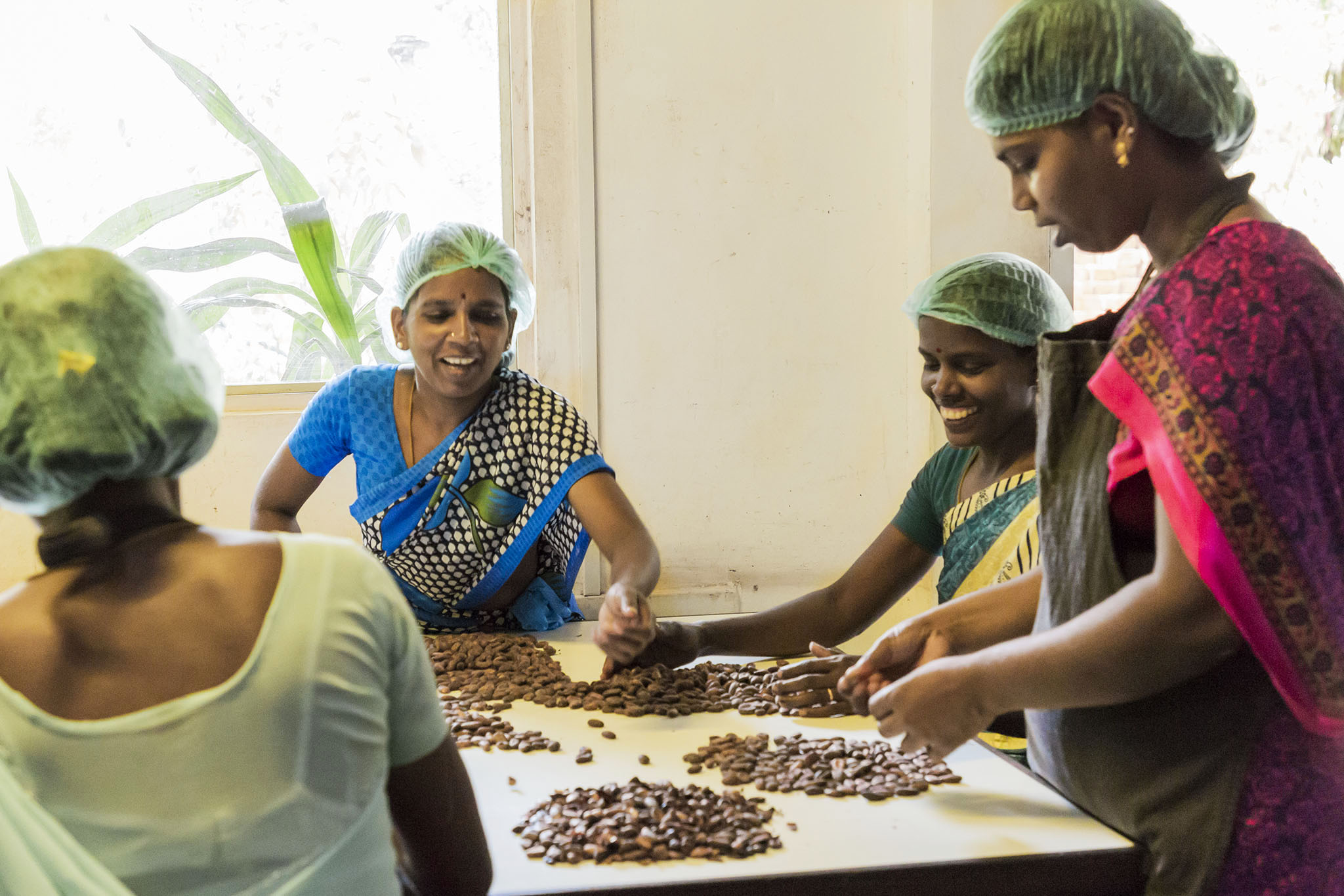 An all-women’s team led by Saraswathi Murthy makes chocolates at Mason & Co. in Auroville, Puducherry. Saraswathi who leads the women in the factory, was first spotted by founders Jane Mason and Fabien Bontems and trained by them in 2013. Photo courtesy Mason & Co.
