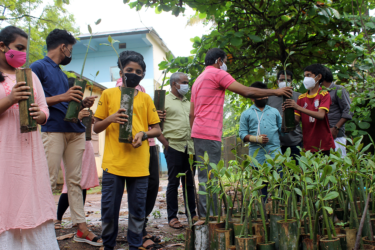 Students of Government Fisheries High School at Marakkappu in Kasargod district at a mangrove nursery setup by Pokkudan Mangrove Trust. Photo by J U Bhavapriya.