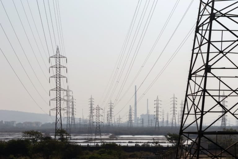 Power lines in Mumbai. The green grid initiative will try linking solar grids across borders so that parts of the world with excess renewable power can send it to areas that have deficits. Photo from Unsplash.