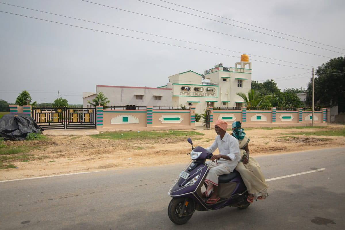 People who receive regular compensation by leasing land to the solar park often spend the amount in fuel, vehicles and renovations without long-term financial planning. Photo by Abhishek N. Chinnaappa/Mongabay.