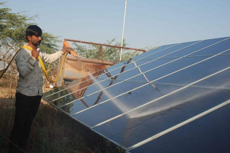 Against the 30,000 jobs from the solar park, announced at the time of the inauguration, today only about 60 people from the village are employed as security guards, technicians or in grass cutting and panel washing. Photo by Ravleen Kaur.