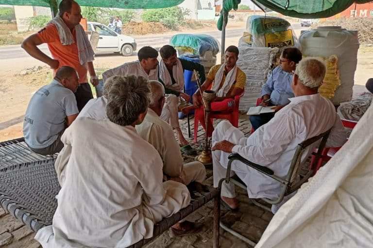 Farmers of Imlota village discuss ways to deal with groundwater issues at a Chaupal. Photo by Sat Singh.