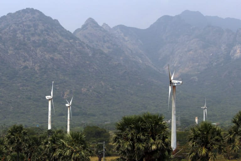 Wind turbines in one of Asia's largest wind farms along the Tirunelveli-Kanyakumari state highway roads in Tamil Nadu. Old windfarms when repowered, produce a lot more energy, which will help India meet its renewable energy targets. Photo by Priyanka Shankar/Mongabay.