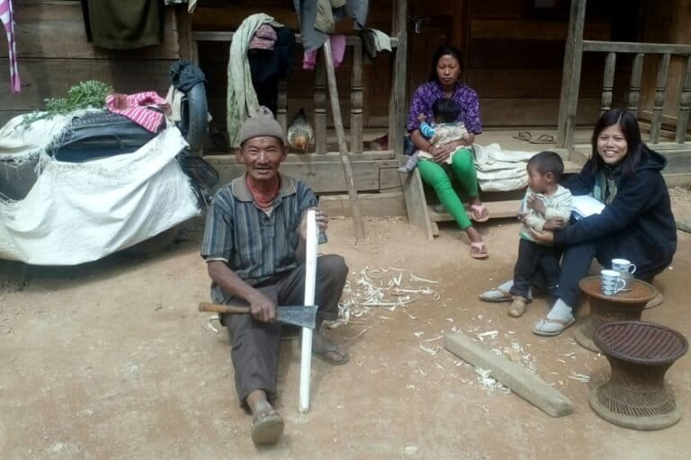 Borah discussing with farmers about jhum cultivation in the village of Fakim. Photo from Joli Rumi Borah.