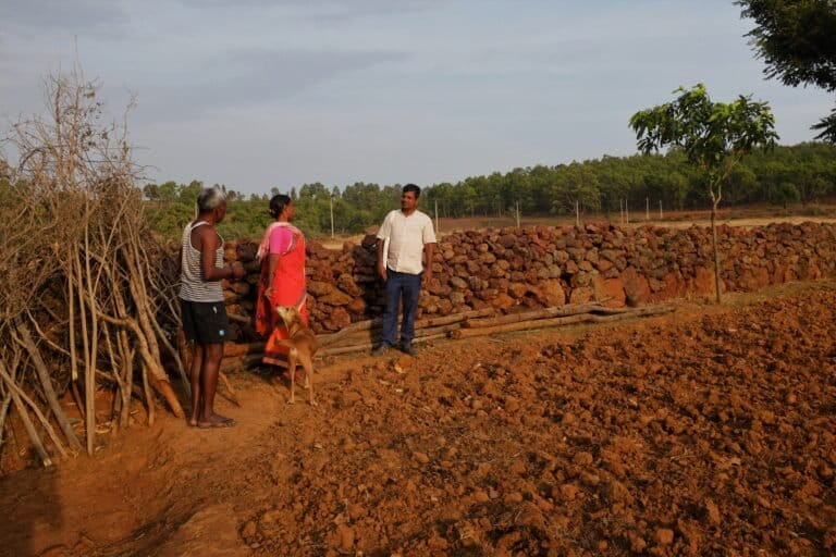 Bhairab Saini (right) with some farmers. Bhairab practises multilayer farming.