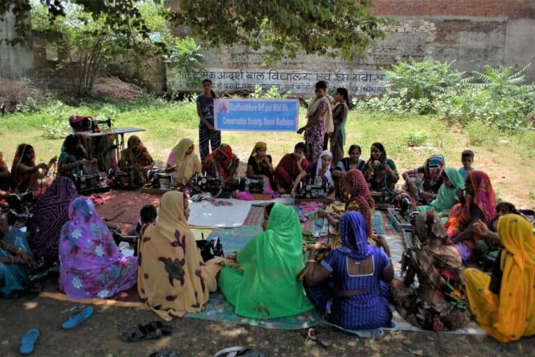 Local women make cloth bags as an alternative to plastic bags at Ranthambore Tiger Reserve. Photo by Sanjay Rattan