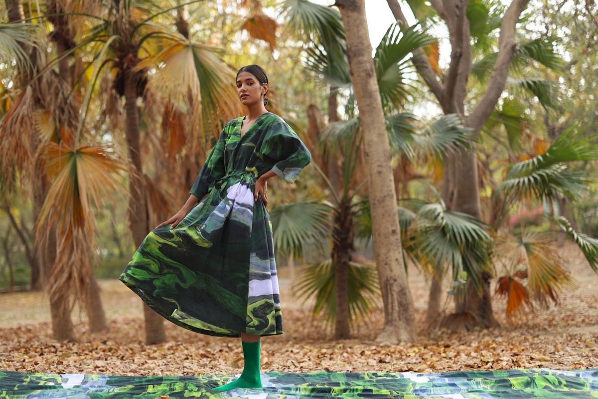 A dress by Doodlage made from deadstock fabric. Typically, deadstock textiles languish in warehouses or are incinerated or landfilled, causing negative environmental impacts. Image courtesy of Doodlage.