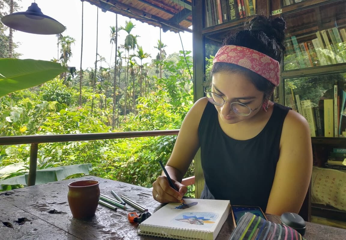 Labonie works on an illustration. Image courtesy of Labonie Roy.