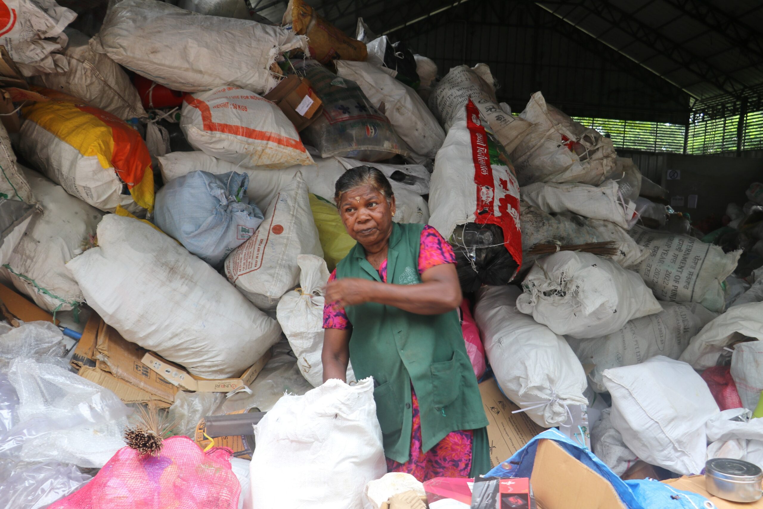 A Haritha Karma Sena worker at a material collection facility in Kochi, Kerala. Image by C. Surendranath.