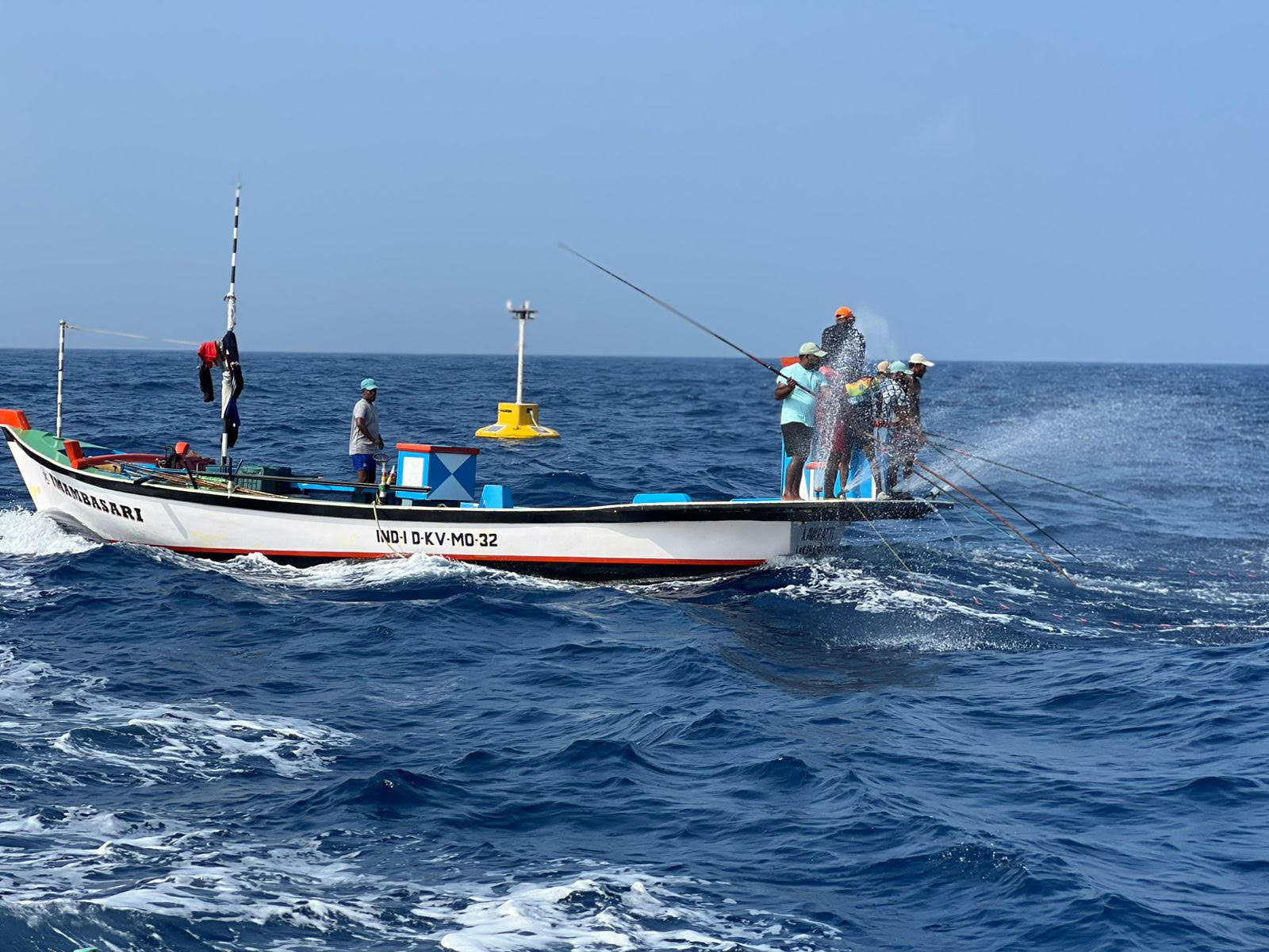 Fishermen from Kavaratti at work, performing pole-and-line fishing in the deep-sea area. Image by K.A. Shaji.