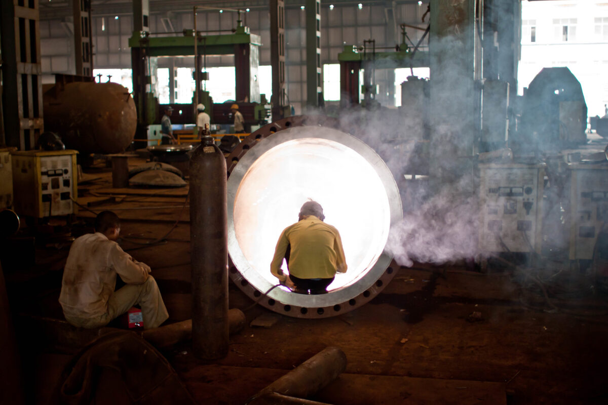 A welder at work in a steel manufacturing unit. Representative image by Jay Hariani via Flickr (CC BY-SA 2.0).