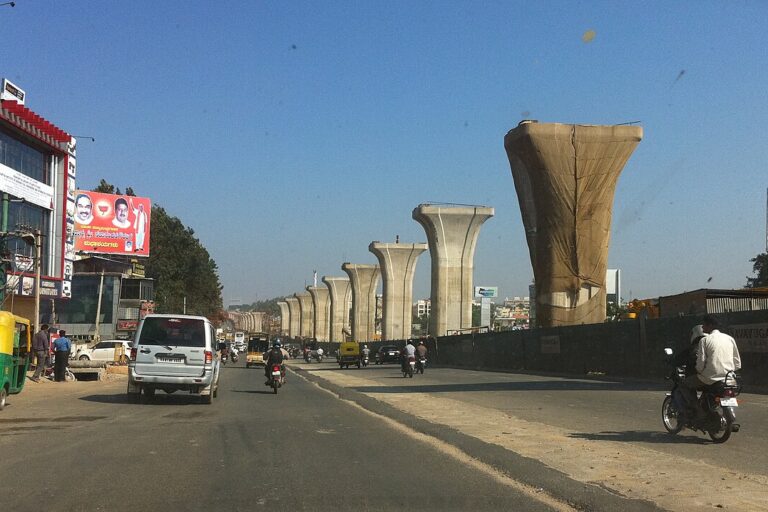 A highway under construction in Bengaluru. Ordinary earth is used widely as a raw material in infrastructure projects such as highways and railway lines. However, its unregulated extraction can pollute groundwater and strip fertile topsoil. Image by Victorgrigas via Wikimedia Commons (CC BY-SA 3.0).