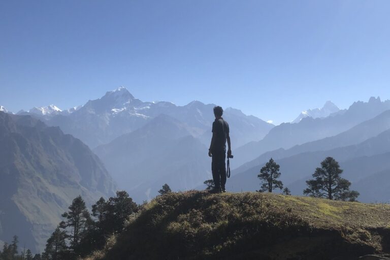 Shanavas near Mount Dronagiri. As Shanavas recounts his time through his childhood years in his book, we start to see his relationship with the natural world around him evolve. Image by Elizabeth Buttram.