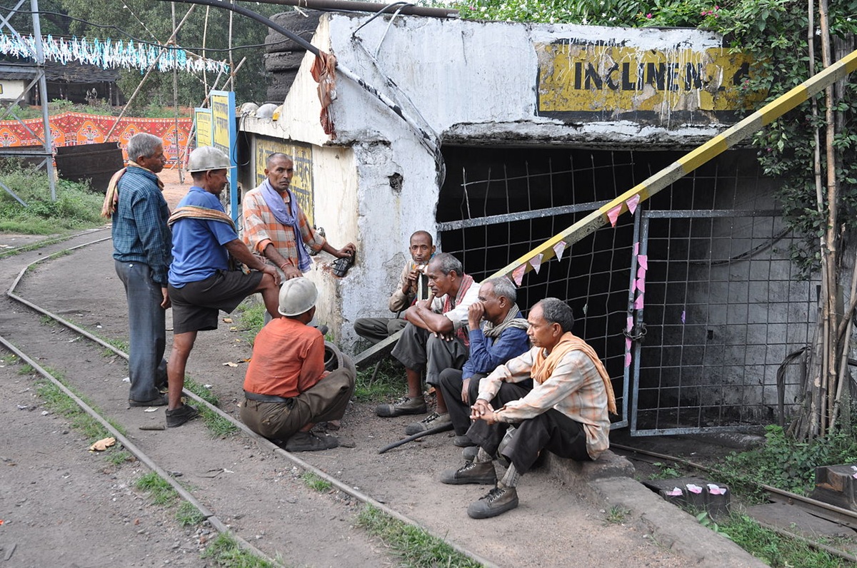 Underground coal miners before entering the pit of Bachra coal mines in Jharkhand. While private investors are expected to fund clean energy infrastructure, addressing socio-economic impacts like job losses will largely depend on public financing as per the expert.