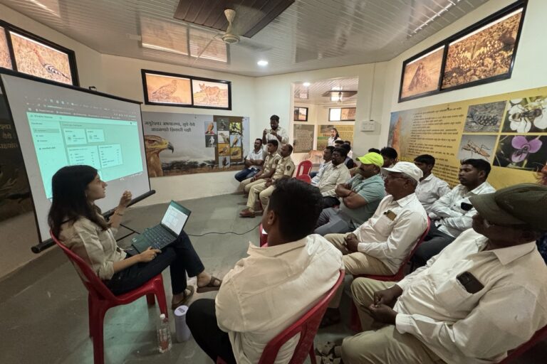 Prerana Sethiya conducts a session to onboard community members onto the Wildlife Watchers app. Image courtesy of The Grasslands Trust.