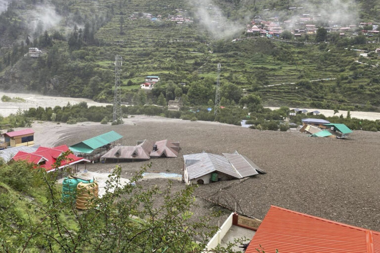 Inundated houses following flash floods in Dharali, Uttarakhand on August 5, 2025. Satellite data showed indications of a flash flood here, with widened stream channels, altered river morphology and widespread damage to human lives infrastructure. (India Army via AP)