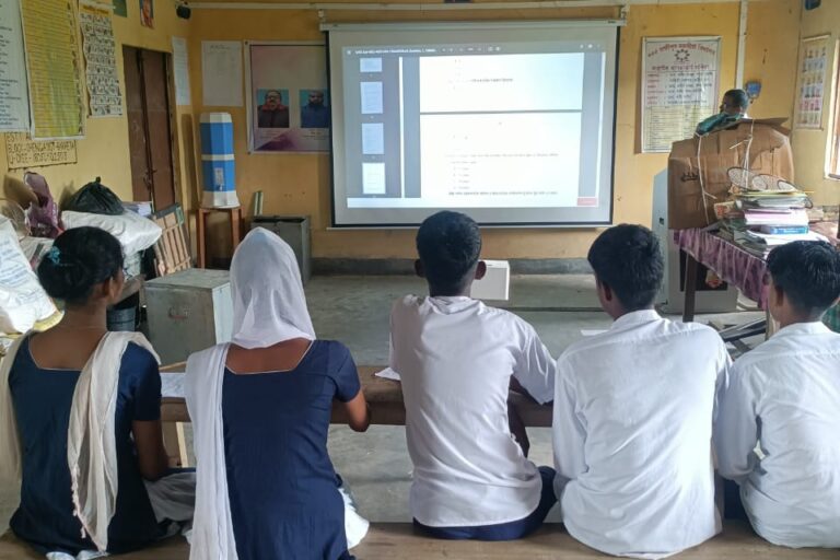 Students during an e-class at Lakhipur MV School. Image courtesy of Jaher Ali.