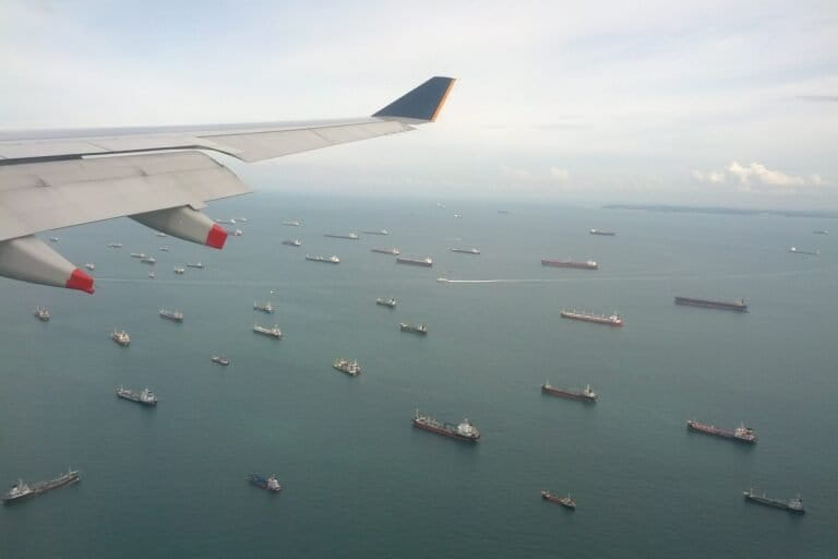 An aerial view of the Strait of Malacca in Malaysia shows countless ships that frequent this busy shipping route. Plastic debris belonging to Southeast Asian countries was also recorded in the surveys at the Andaman archipelago, possibly a result of the proximity of the archipelago to the Strait. Image by Leo Gaggl via Flickr (CC BY-NC-SA 2.0).