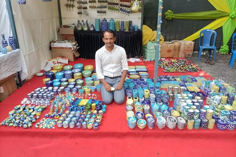 Ramniwas Kumar, a blue pottery craftsman in Rajasthan, displays his pieces. Image courtesy of Ramniwas Kumar.