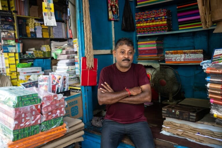 Dipak Bhowmik, a 62-year-old paper seller, says he lost almost ₹50,000 worth of paper stock due to water damage Image by Subhrajit Sen.