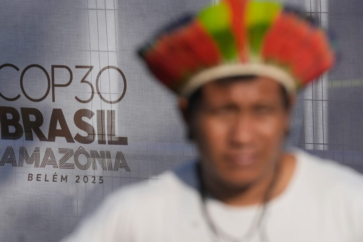 An Indigenous man takes part in a demonstration for the conservation of the Amazon rainforest at COP30 on November 6, 2025. (AP Photo/Eraldo Peres)
