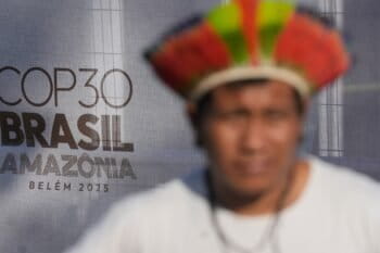 An Indigenous man takes part in a demonstration for the conservation of the Amazon rainforest at COP30 on November 6, 2025. (AP Photo/Eraldo Peres)