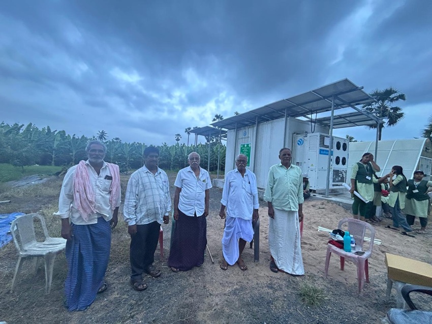 Sambi Reddy and Bonthu Koti Reddy with other farmers at their cold storage unit in Kollipara village, Guntur, Andhra Pradesh. Image by Kavitha Yarlagadda.
