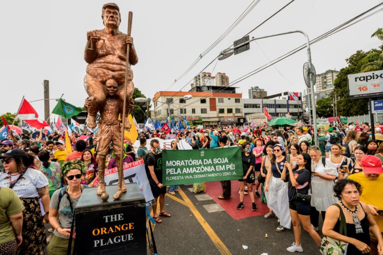 Protestors from Mighty Earth, a nonprofit organisation that marched to defend the Amazon Soy Moratorium, which restricts the cultivation of soy on land recently cleared of forest. Image by André Ferreira/Mighty Earth.