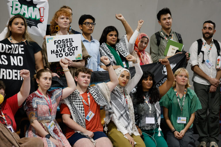 Youth at COP30 protest against fossil fuels, for a global just transition to clean energy and climate action. Image © UN Climate Change - Zô Guimarães.