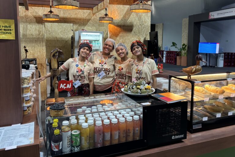 The team at Delícias Quilombolas, a family-run food stall that drew some of the longest queues in the COP30 Blue Zone in Belém. Image by Manish Chandra Mishra.