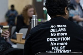 Delegates speak informally before the start of closing plenary Image © UN Climate Change - Kiara Worth via Flickr (CC BY-NC-SA 4.0).