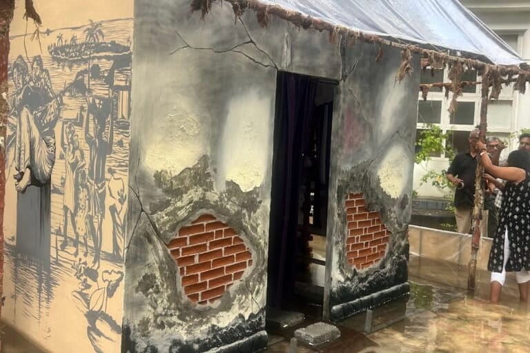 An exhibit depicts saline intrusion into homes along Kochi’s backwaters. Image by K.A. Shaji.