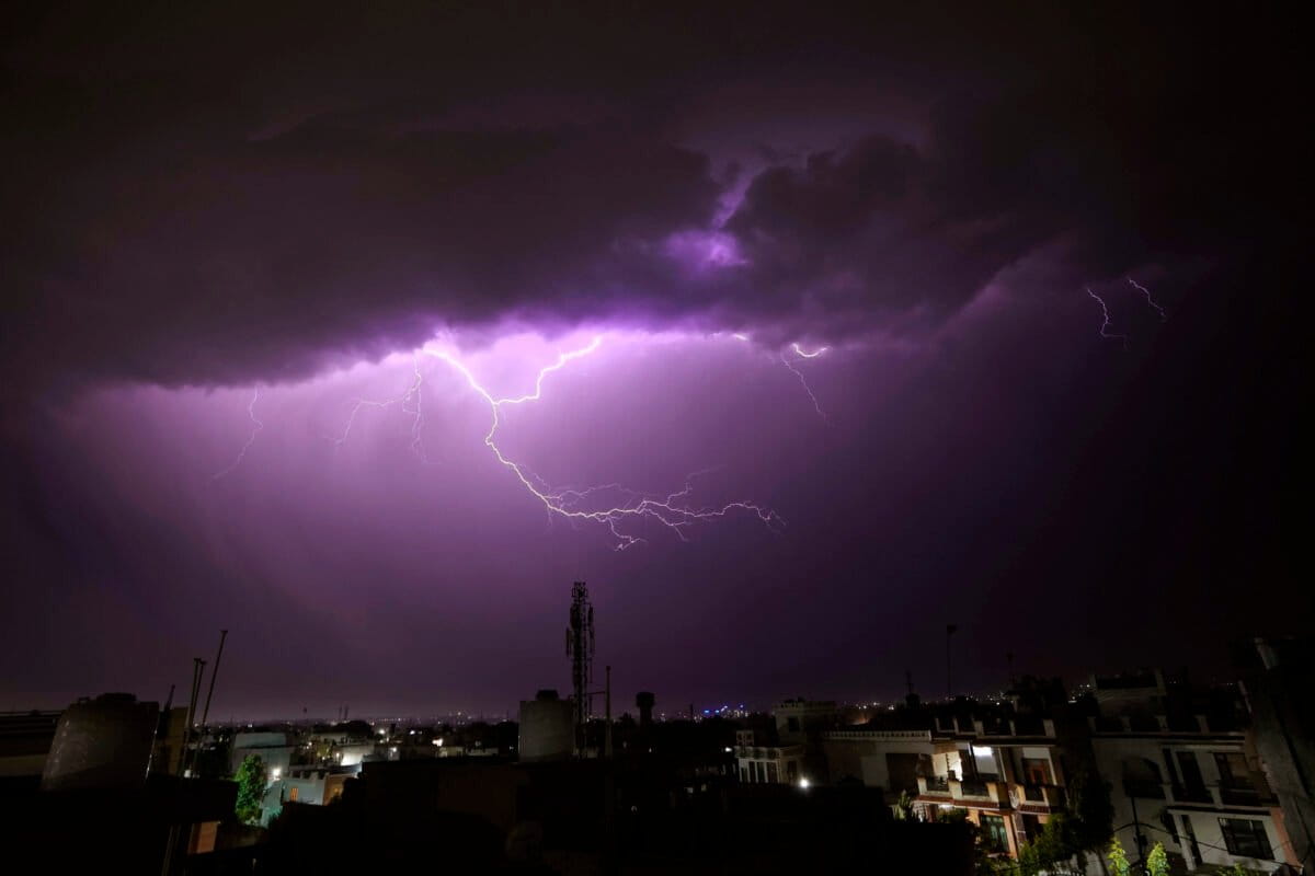 A bolt of lighting strikes over in Jammu. (AP Photo/Channi Anand)