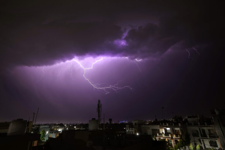 A bolt of lighting strikes over in Jammu. (AP Photo/Channi Anand)