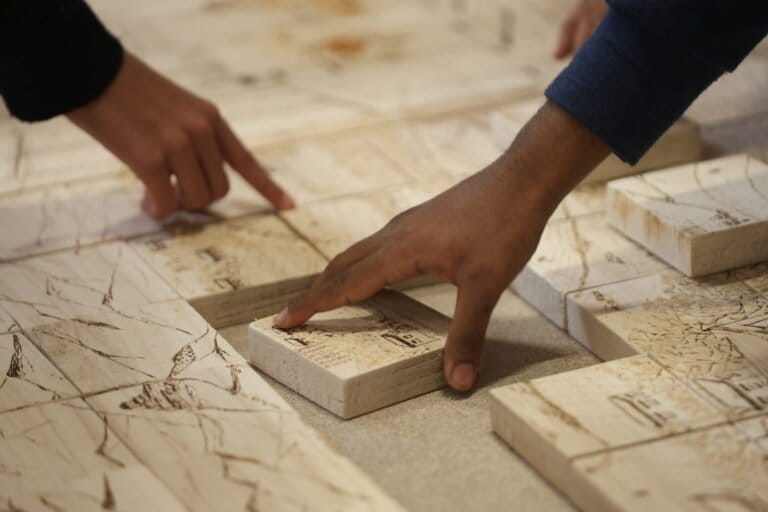 Artists trace the journey of food, environment and livelihoods 3 Multidisciplinary artist Anuja Dasgupta’s puzzle-based artwork traces the apricot production cycle — labour, seasonality and loss, showing how climate extremes disrupt both crops and people’s lives. Image courtesy of Sustaina India.