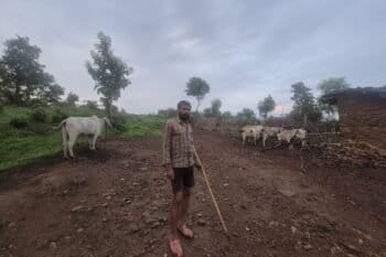 Rama Shankar with his family's cattle in Doda Mafi village. Image by Shivam Bhardwaj.
